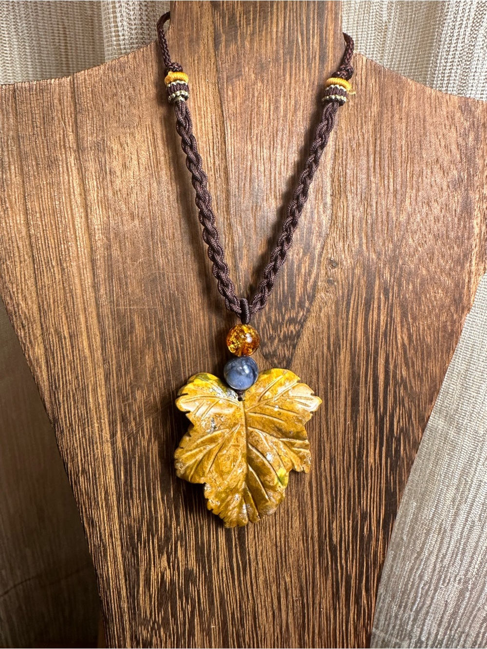 Yellow Ocean Jasper Leaf Carving Pendant Necklace on Brown Braided Rope